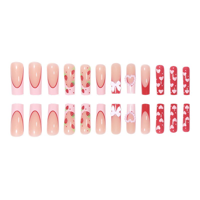 Unghie finte eleganti con fiocco a forma di cuore rosa e fragola per San Valentino - Unghie finte indossabili con colla e gel per le donne_voghion.com