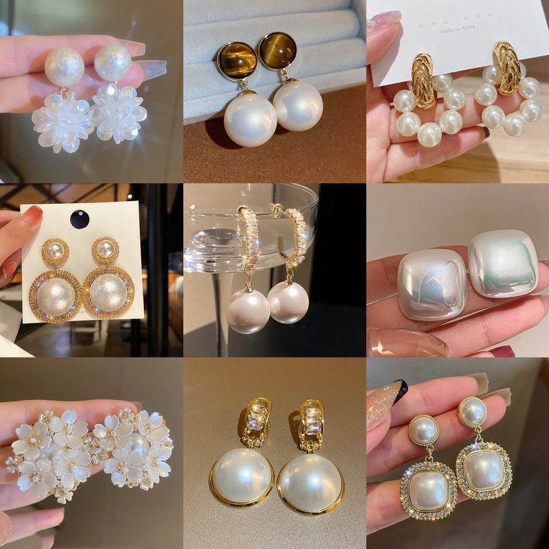 Orecchini pendenti francesi versatili con grandi perle in argento, alla moda, di nicchia, esagerati ed eleganti._voghion.com