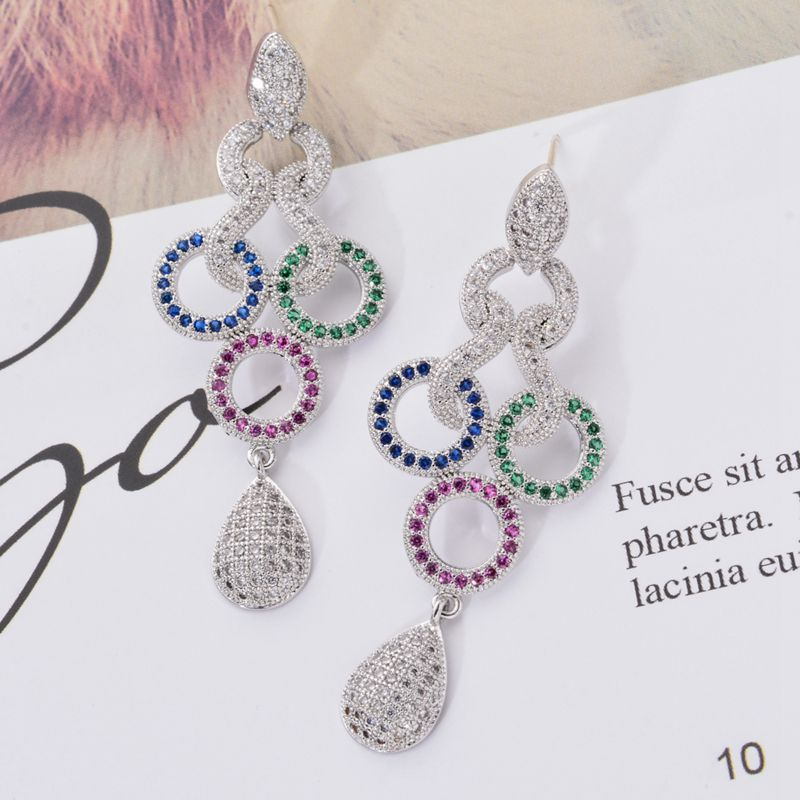 Fashionable long tassel women's earrings with circular water droplets inlaid with zircon fashionable earrings, versatile and high-end feel earrings_voghion.com