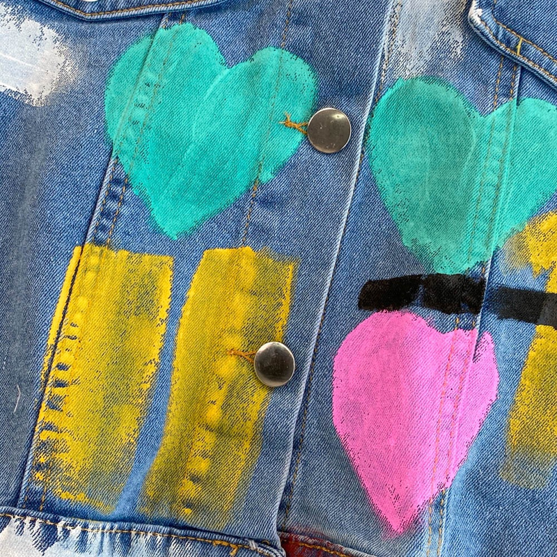 Conjunto de dos piezas de mezclilla con estilo graffiti, falda con abertura en forma de A y cintura alta_voghion.com