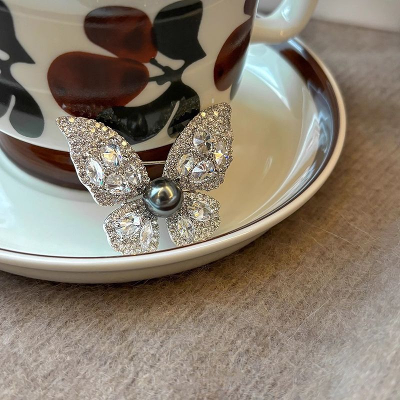 Shijia Tahitiaanse zwarte parel vlinder broche dames pak trui accessoires pin niche ontwerp licht luxe high-end_voghion.com