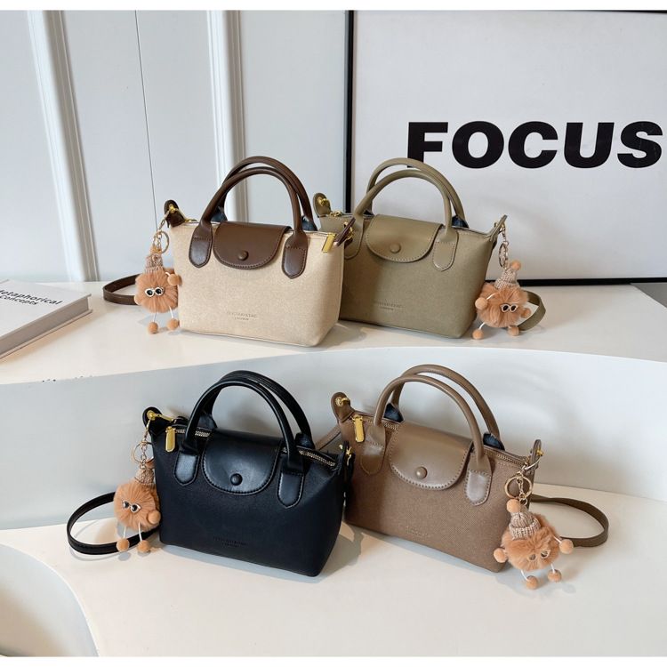 Borse da donna La borsa a forma di gnocco semplice più popolare di quest'anno, la nuova borsa a tracolla a tracolla Xiang Longbags di alta qualità con trama a mano_voghion.com