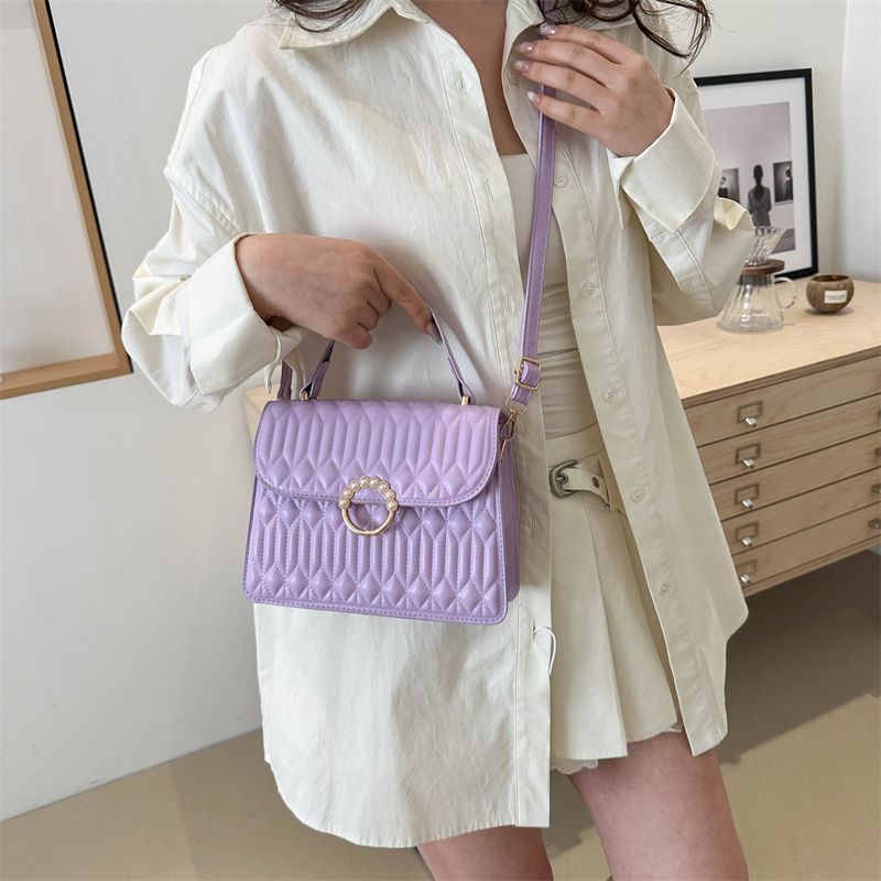 Borsa a tracolla elegante e raffinata, con tracolla quadrata piccola, casual e alla moda, per la primavera 2024._voghion.com