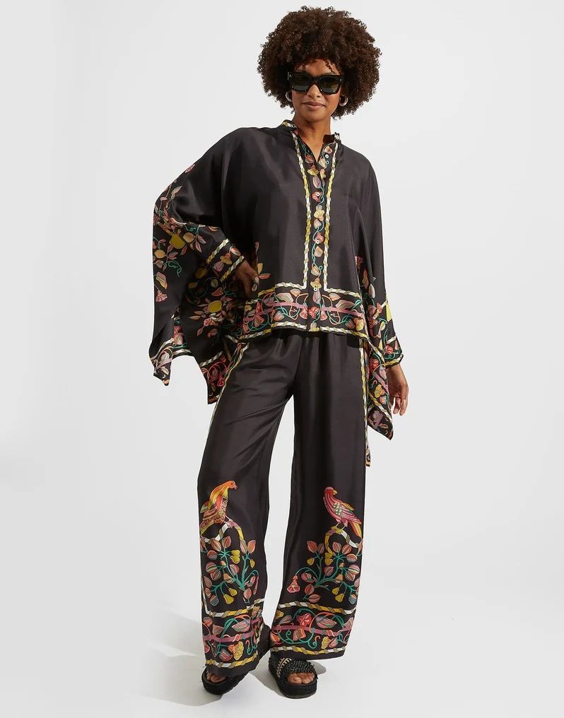 Completo due pezzi da donna con colletto alla coreana e pantaloni irregolari, modello 2025_voghion.com