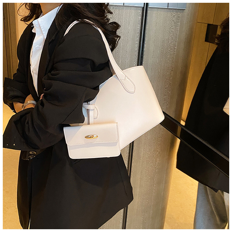 Borsa piccola portatile di moda estiva nuova borsa a secchiello casual semplice da donna 2023 borsa per ascelle suocera con trama di nicchia_voghion.com