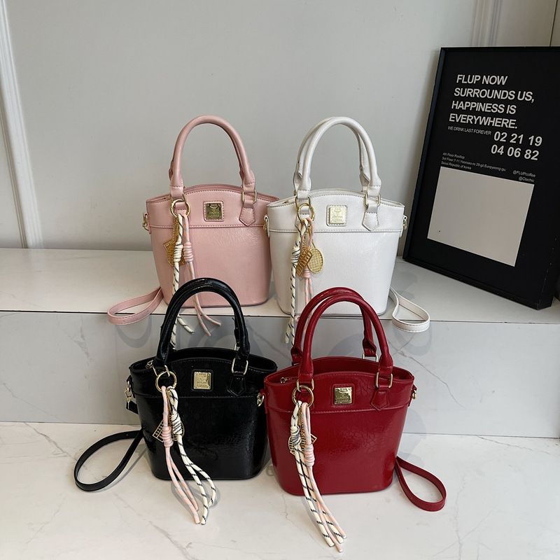 Nuova borsa a mano in tinta unita, tendenza moda, borsa a tracolla versatile da donna, borsa a secchiello di alta gamma per donna_voghion.com