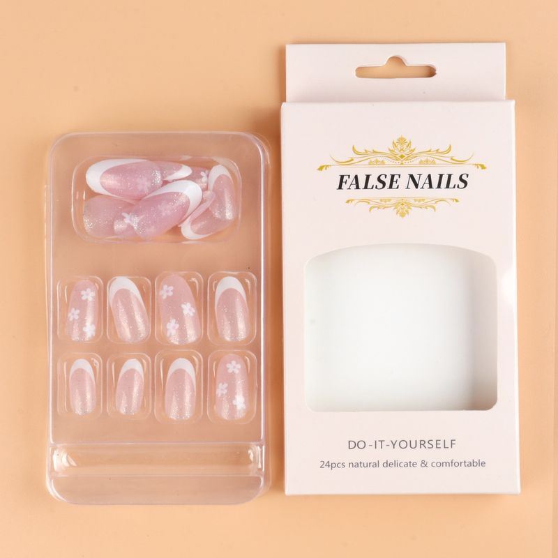 Gold funkelnde French-Träger mit rosa künstlichen Nägeln zum Aufdrücken_voghion.com