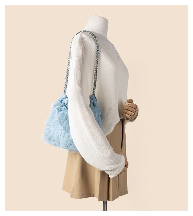 Broken hole denim shoulder sequined mesh, new bucket bag, niche design, high-end feel, large capacity armpit bag_voghion.com