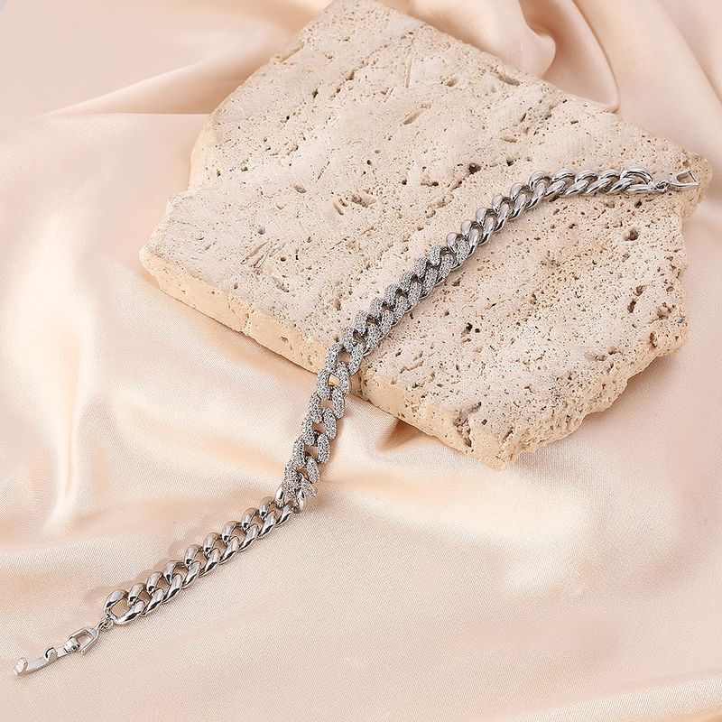 Nuovo braccialetto versatile di lusso leggero con catena cubana alla moda, zircone pieno, pietre preziose colorate, elegante braccialetto in rame micro intarsiato_voghion.com