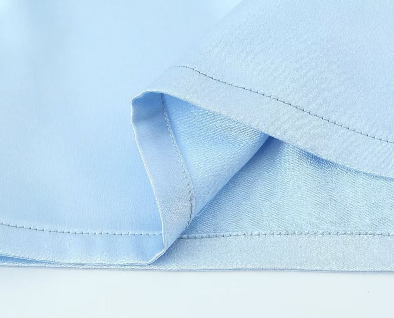 Completo top con nodo a farfalla e pantaloni in raso da donna estate 2024_voghion.com