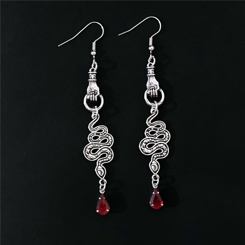 Orecchini Orecchini gotici in cristallo con pendente a forma di serpente, stile bohémien_voghion.com