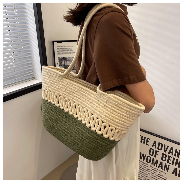 Ühe õlaga õõnestatud puuvillase niidiga uus suvine suure mahutavusega prantsuse õlgedest kootud kott, mereäärne puhkusereisi rannakott_voghion.com