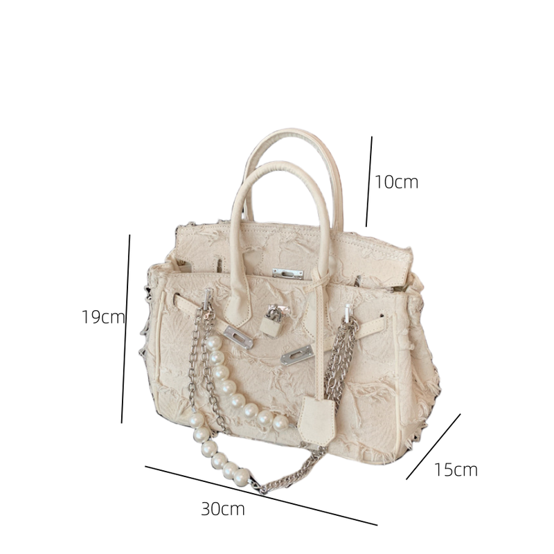 A niche design pearl women's chain bag with a new vintage rag beggar platinum single shoulder crossbody light luxury handbag_voghion.com