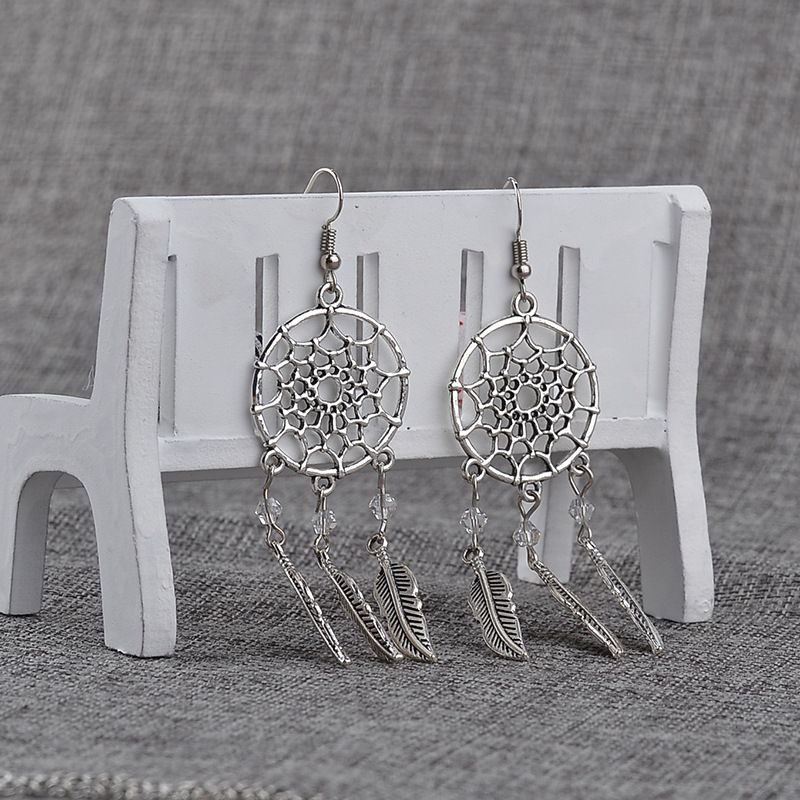 Collier chaud de commerce extérieur chaîne de clavicule féminine personnalité de la mode européenne et américaine attrape-rêves pendentif en plumes collier boucle d'oreille accessoires_voghion.com
