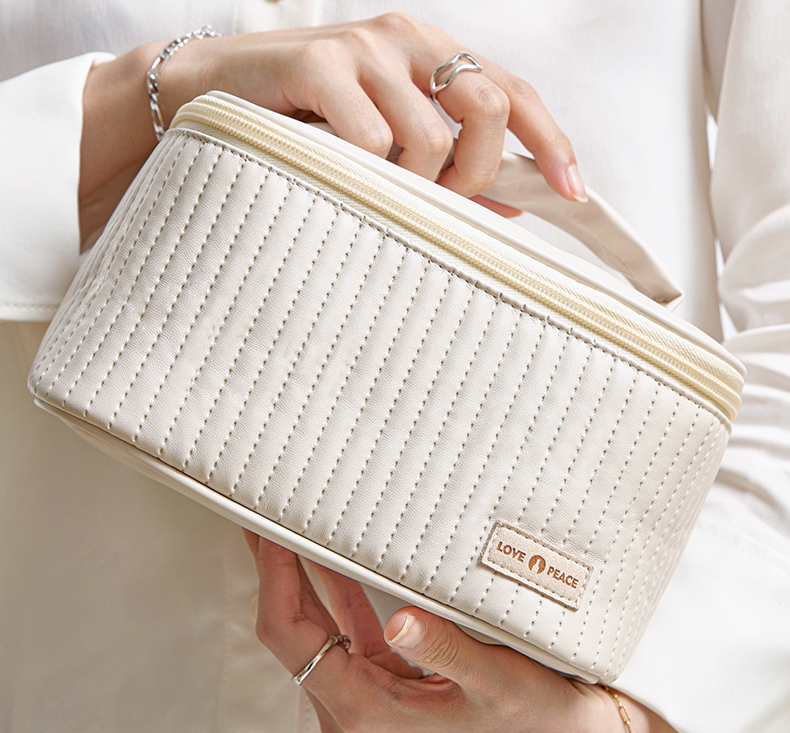 New cake cosmetic bag pu leather large capacity waterproof storage bag portable cosmetics storage bag wholesale_voghion.com