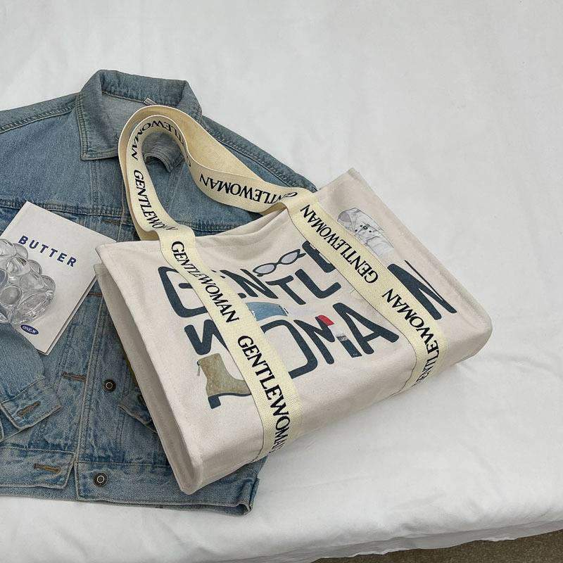 Bolso de lona a la moda para mujer, bolso grande de hombro con borla y letras, material vaquero, bolso de compras de gran capacidad para mujer_voghion.com
