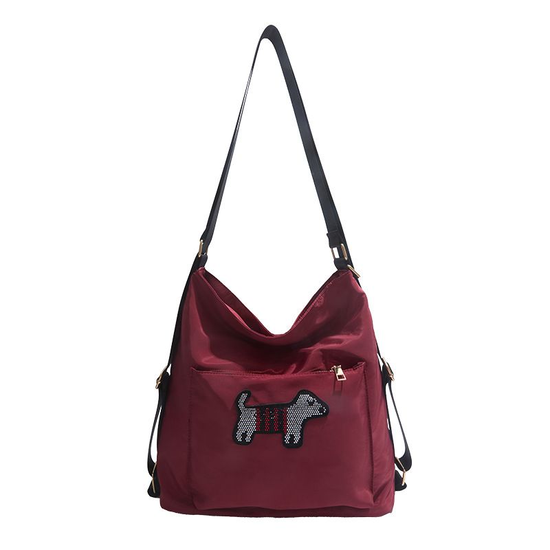 Borsa a tracolla multiuso in stile coreano INS per ragazze, 2025, nuova borsa a tracolla con cucciolo di cartone animato, grande capacità, zaino versatile_voghion.com