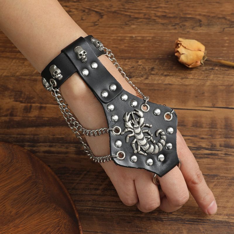 Bracciale in pelle intrecciata con motivo punk con borchie, largo, da uomo, esagerato e alla moda_voghion.com