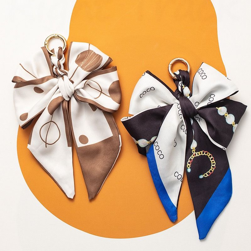 2025 Autumn And Winter Fashion Bag Accessories Keychain Woven Bag Pendant Decorative Bow Bag Pendant Versatile High Sense Retro_voghion.com