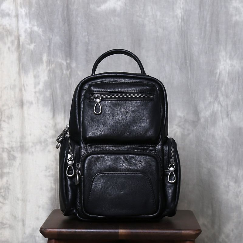 Black men's backpack, new casual leather small backpack, top layer cowhide chest bag, multifunctional travel crossbody bag_voghion.com