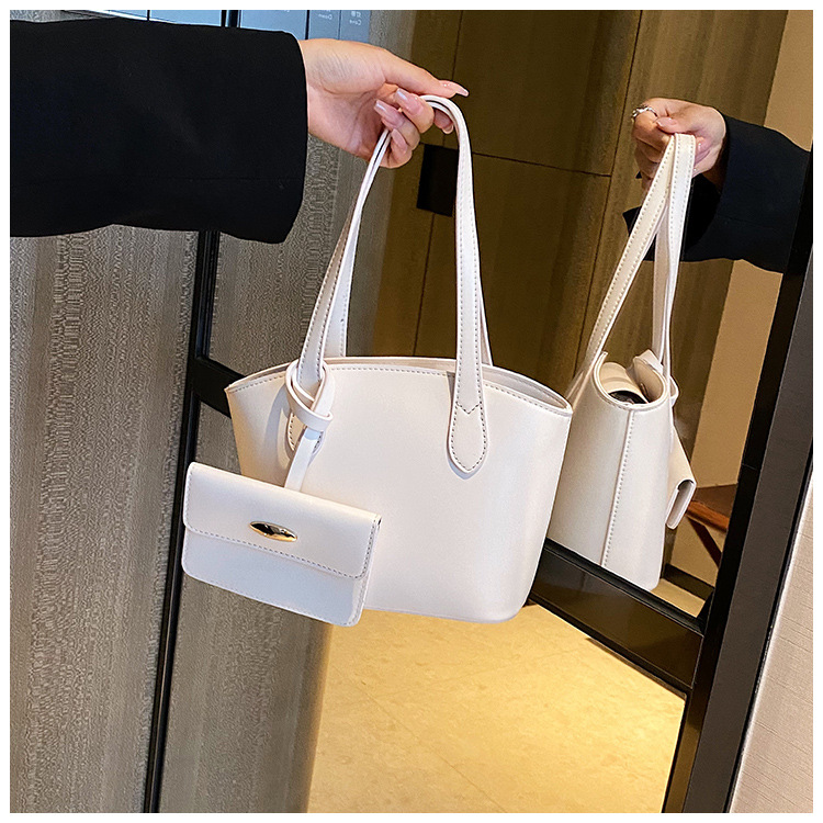 Borsa piccola portatile di moda estiva nuova borsa a secchiello casual semplice da donna 2023 borsa per ascelle suocera con trama di nicchia_voghion.com