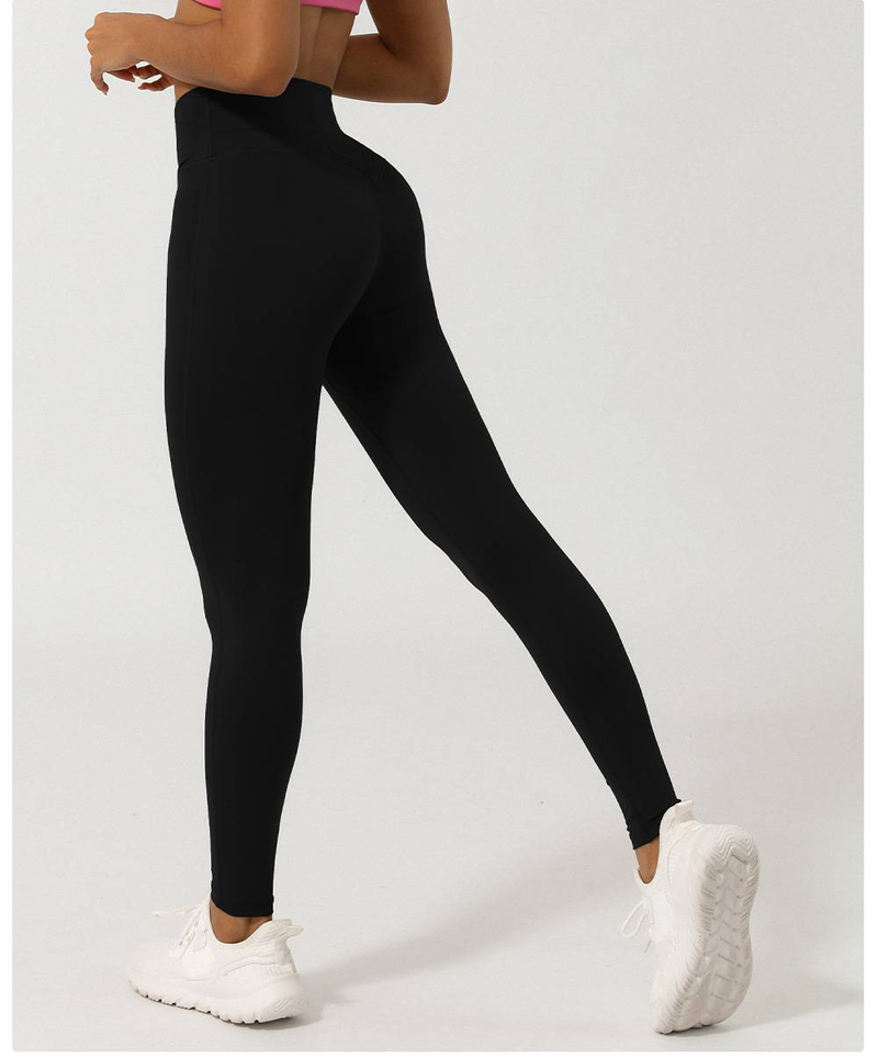 Women's Nude Cross V-shaped Nine Point Yoga Pants Without T-line Peach Hip Lifting Quick Drying Sports Pants_voghion.com