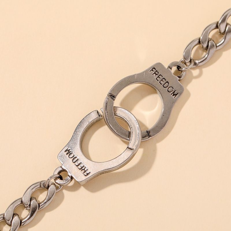 Braccialetto di coppia alla moda con manette in acciaio inossidabile, minimalista, hip-hop, semplice e creativo, con incisione "Freedom"._voghion.com