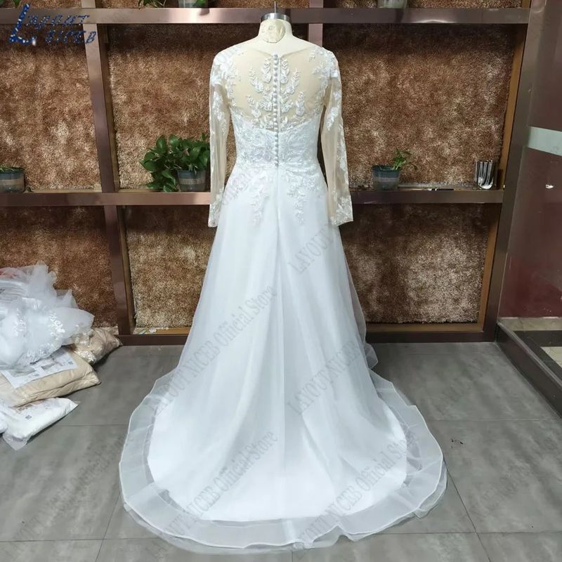 Elegant Plus Size Wedding Dress With Long Train, Flattering A-Line Silhouette, High Waist Design For Brides – Long Sleeve Lace Gown_voghion.com