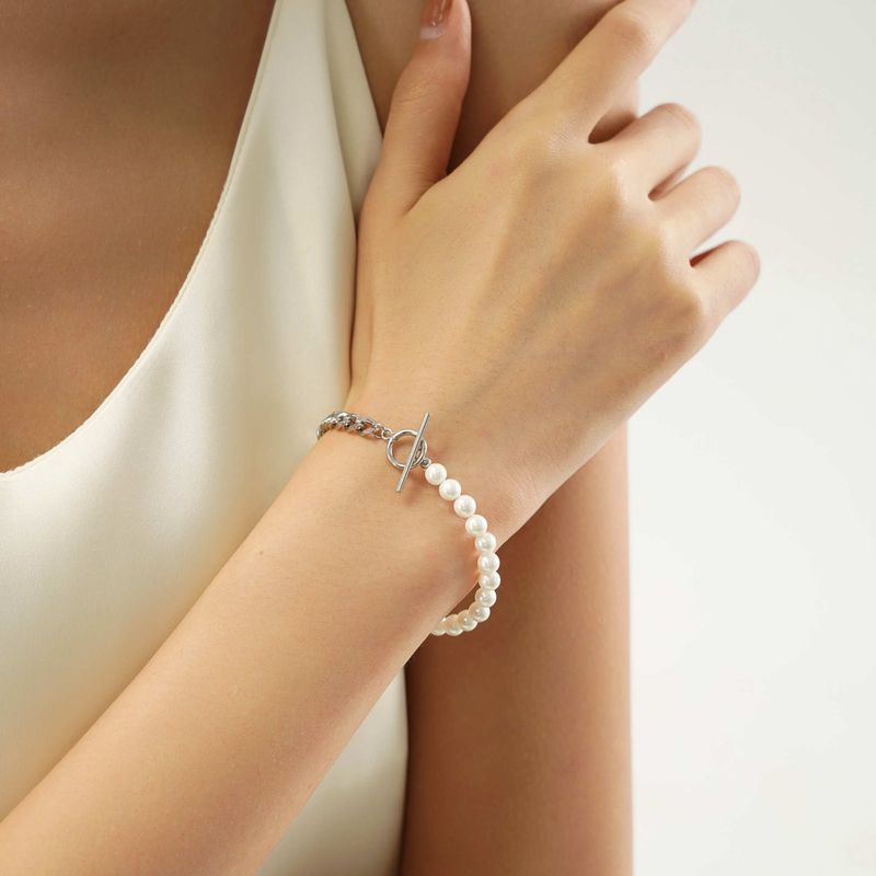 Damessieraden Franse titanium stalen parelarmbandcollectie met ingelegde kralen en roestvrij staalontwerp_voghion.com