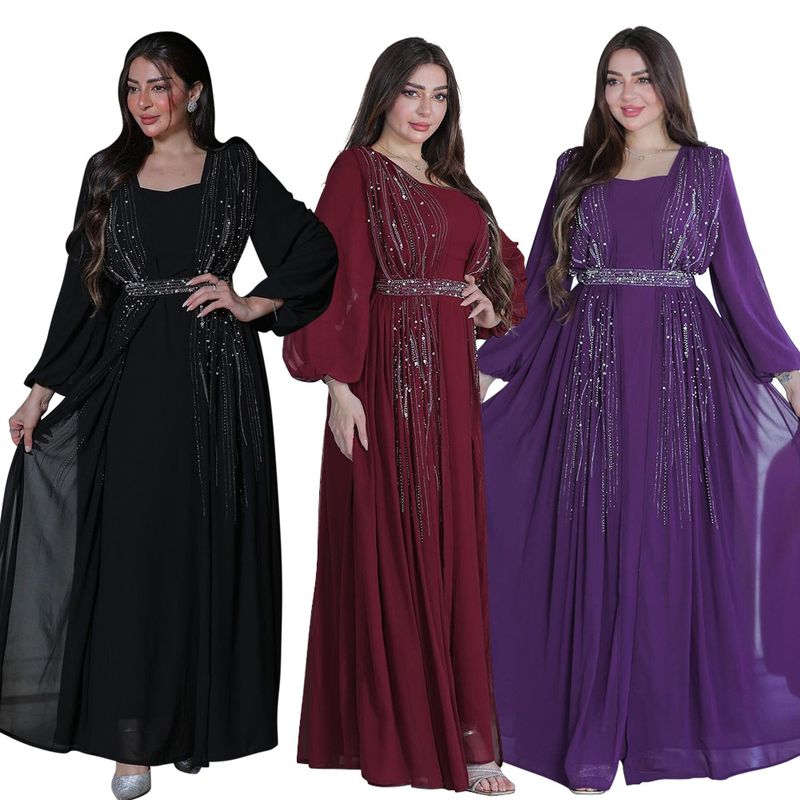 Abito da sera con cintura e gonna lunga da donna_voghion.com
