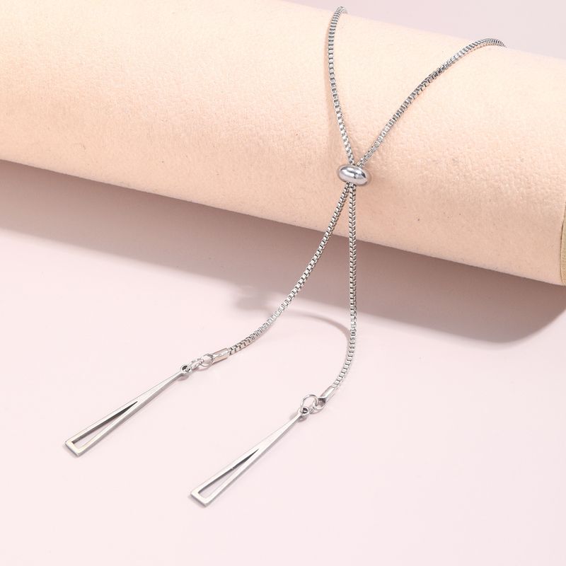 2025 Damenmode Modische minimalistische silberne Damenkette mit langen Quasten und geometrischem Reißverschlussdesign, Schlüsselkette, 2024 Schmuckkette_voghion.com