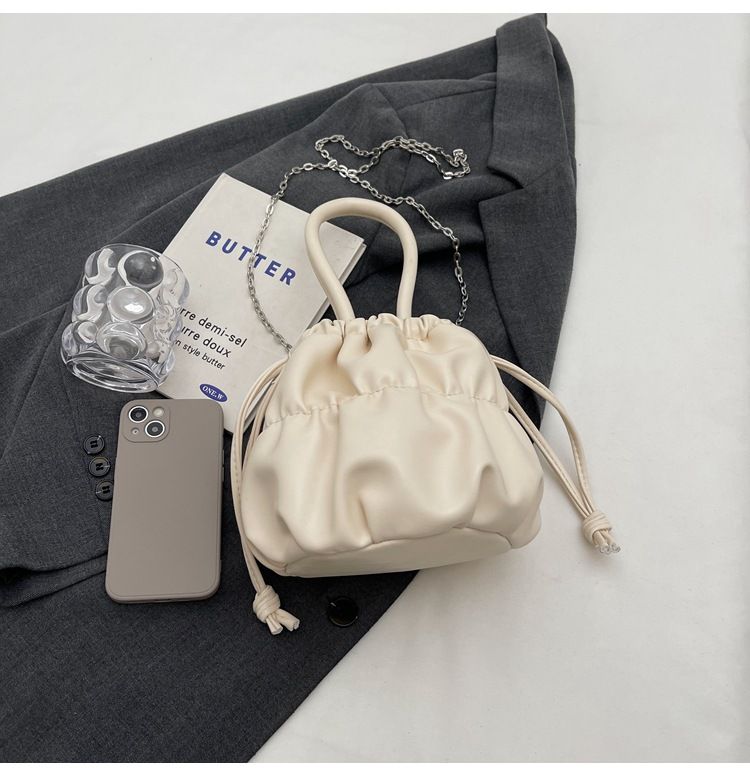 Korean high-end soft glutinous cloud bucket bag, niche pleated handbag, cute ins shoulder crossbody bag_voghion.com