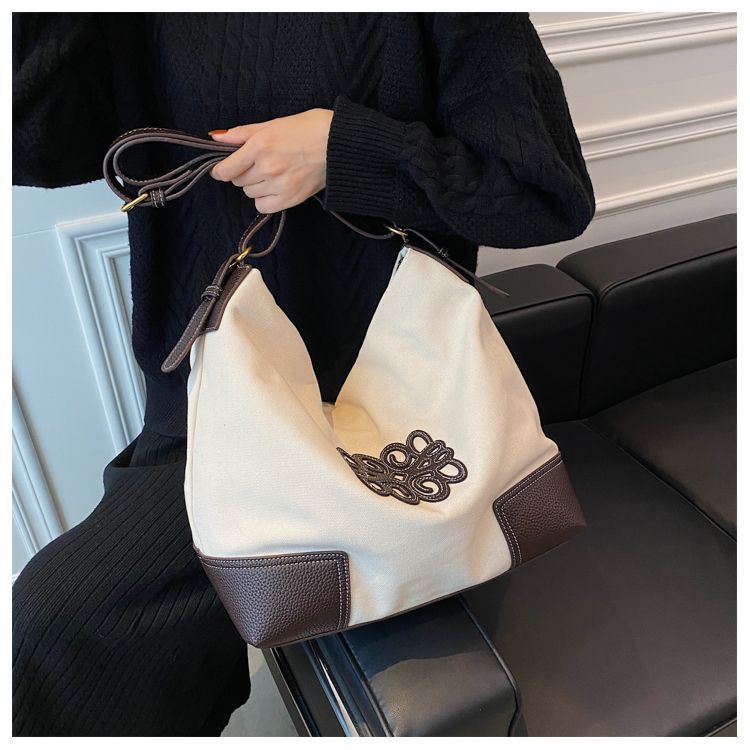 Large Capacity Women's 2025 New Trendy Fashion Canvas Bucket Shoulder Versatile Niche Casual Crossbody Bag_voghion.com