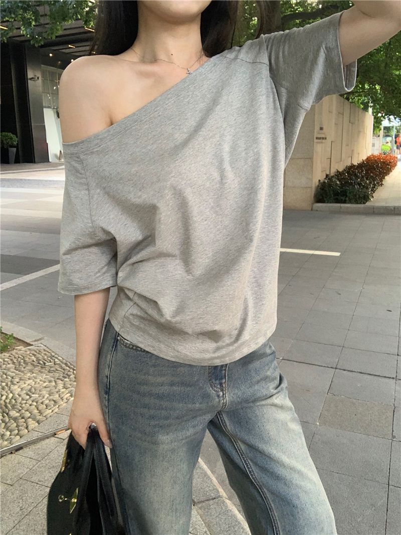 T-shirt ample à manches courtes et épaules obliques pour femme, haut décontracté, irrégulier, couleur unie, polyvalent, été 2025_voghion.com