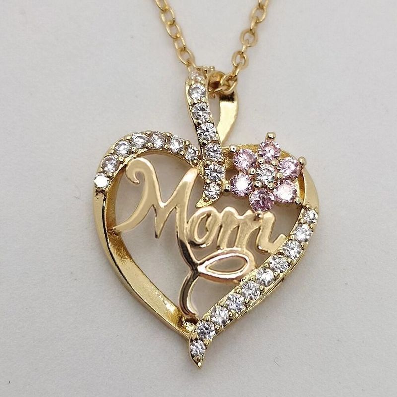 Collana versatile con fiore a forma di cuore elegante e nuova moda 2023 per donna con ciondolo semplice MOM di lusso leggero in zircone intarsiato_voghion.com