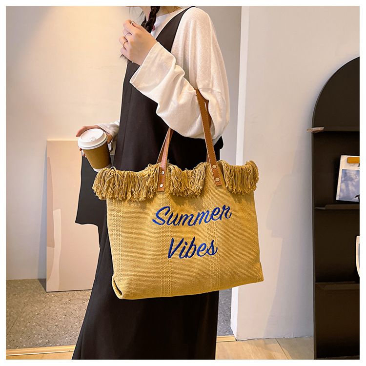 Beach canvas shoulder women's large tassel bag, lightweight embroidered underarm bag_voghion.com