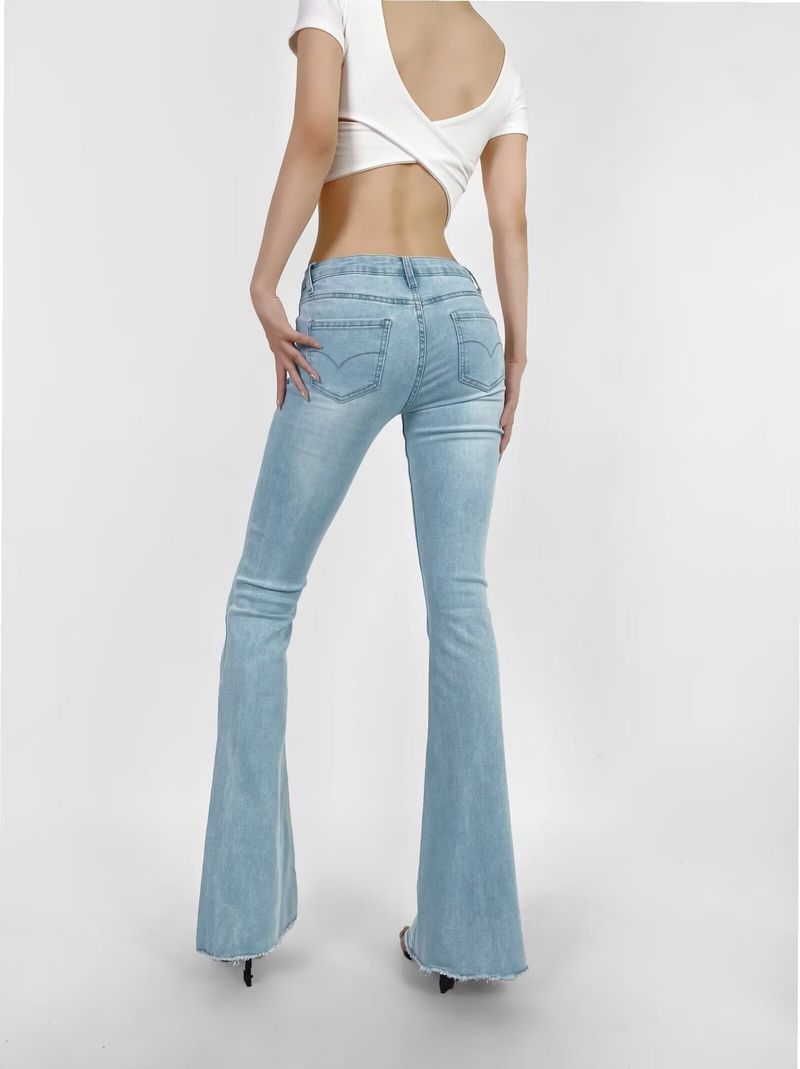 Naiste riided Seksikad madala vöökohaga õhukesed puusad kallistavad toore servaga laienevad püksid Naiste pestud mikro laienenud teksapüksid_voghion.com