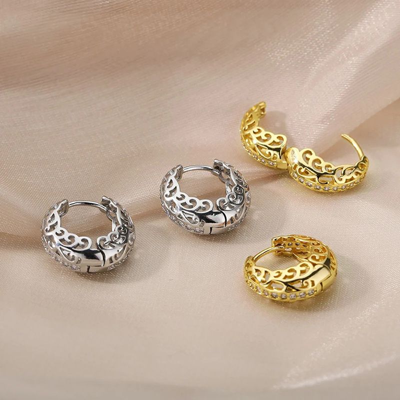 Cao Shi's hot selling with hollow out design, floral micro inlaid ear buttons, textured circles, geometric earrings_voghion.com
