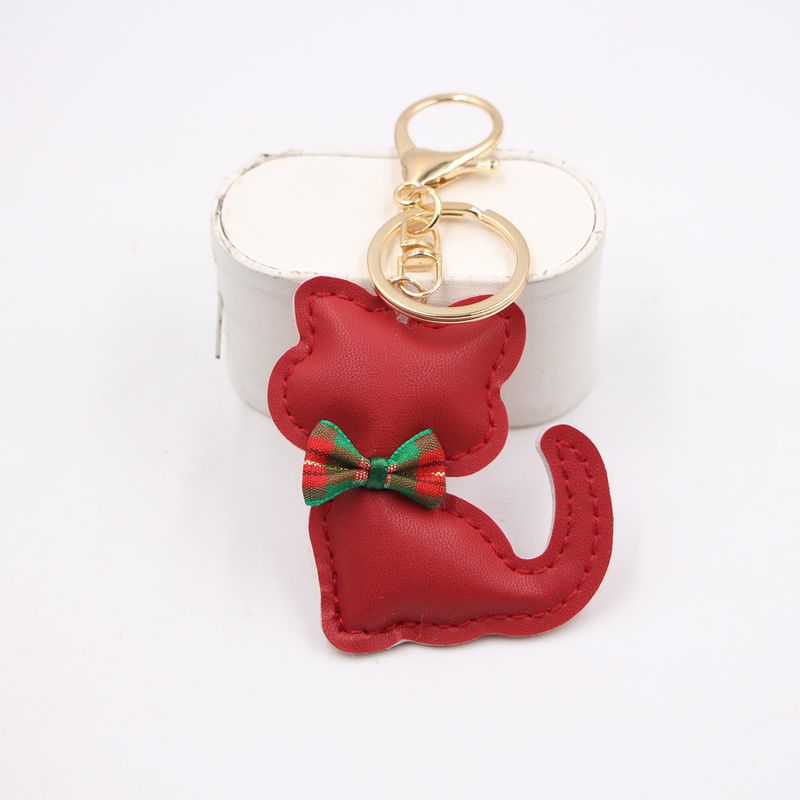 Nuovo ciondolo portachiavi in pelle a forma di papillon con gatto, accessorio per zaino, portafoglio_voghion.com
