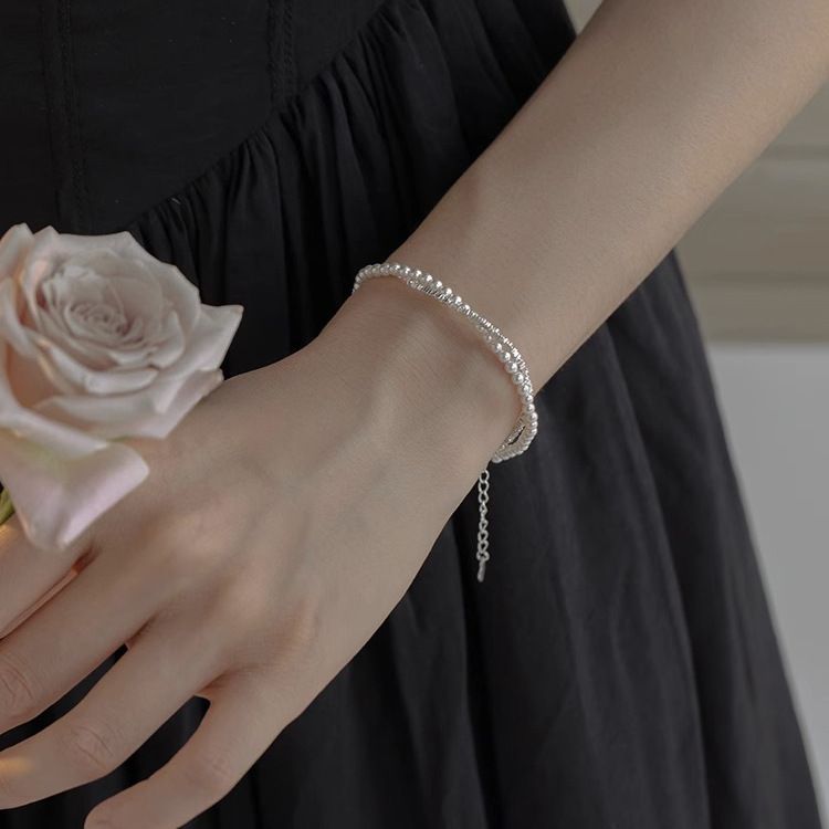 Gedraaide zilveren parelarmband voor dames, licht luxueus nicheontwerp, hoogwaardige kralensieraden, prachtig cadeau voor meisjes_voghion.com