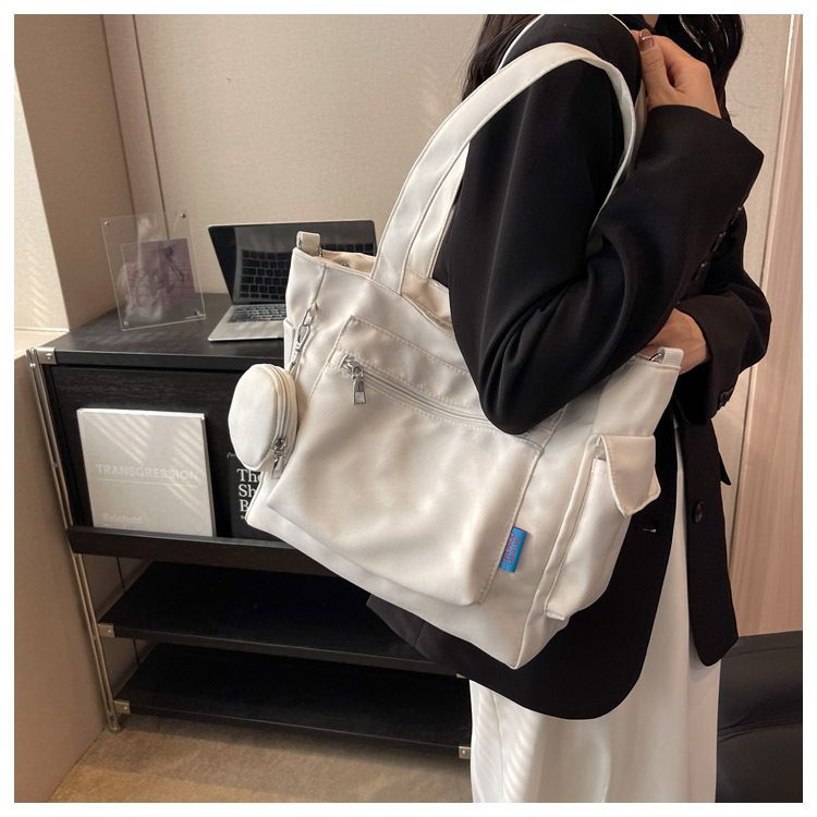New Solid Color Canvas Bag Large Capacity Single Shoulder Bag Handheld Student Versatile Tote Bag Crossbody Bag_voghion.com