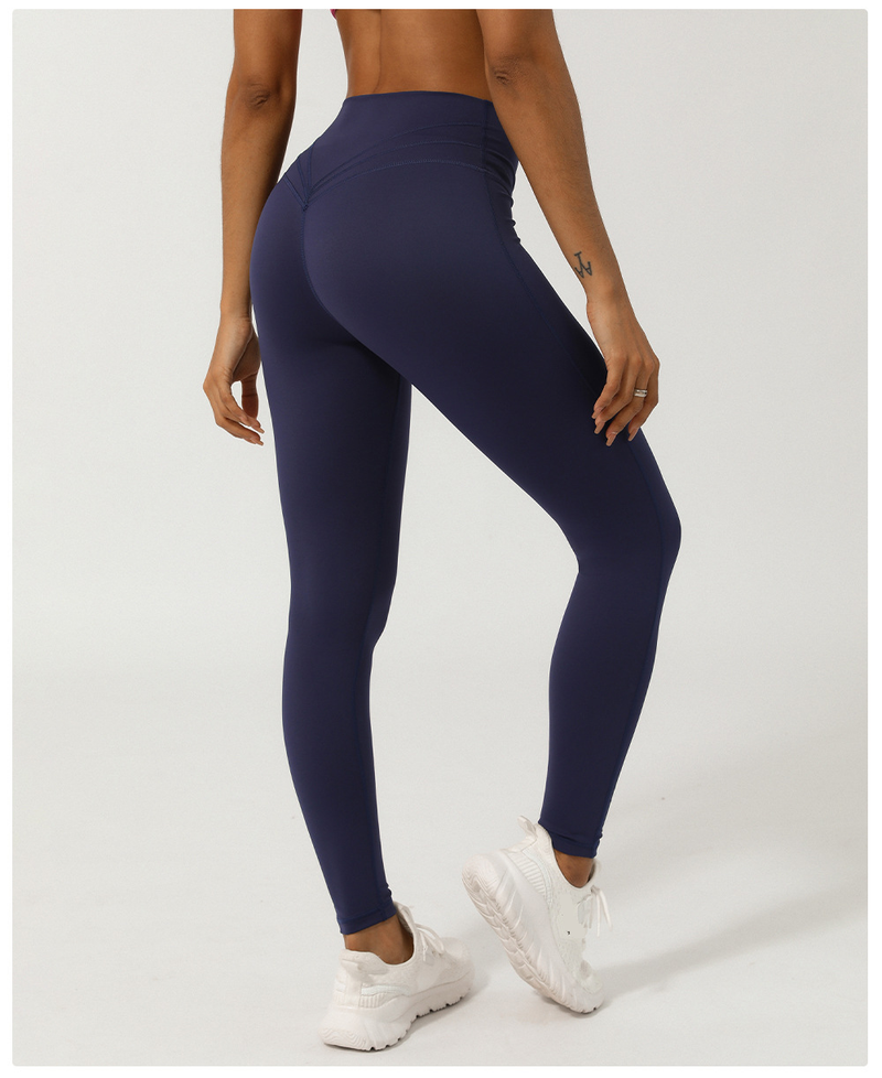 Women's Nude Cross V-shaped Nine Point Yoga Pants Without T-line Peach Hip Lifting Quick Drying Sports Pants_voghion.com