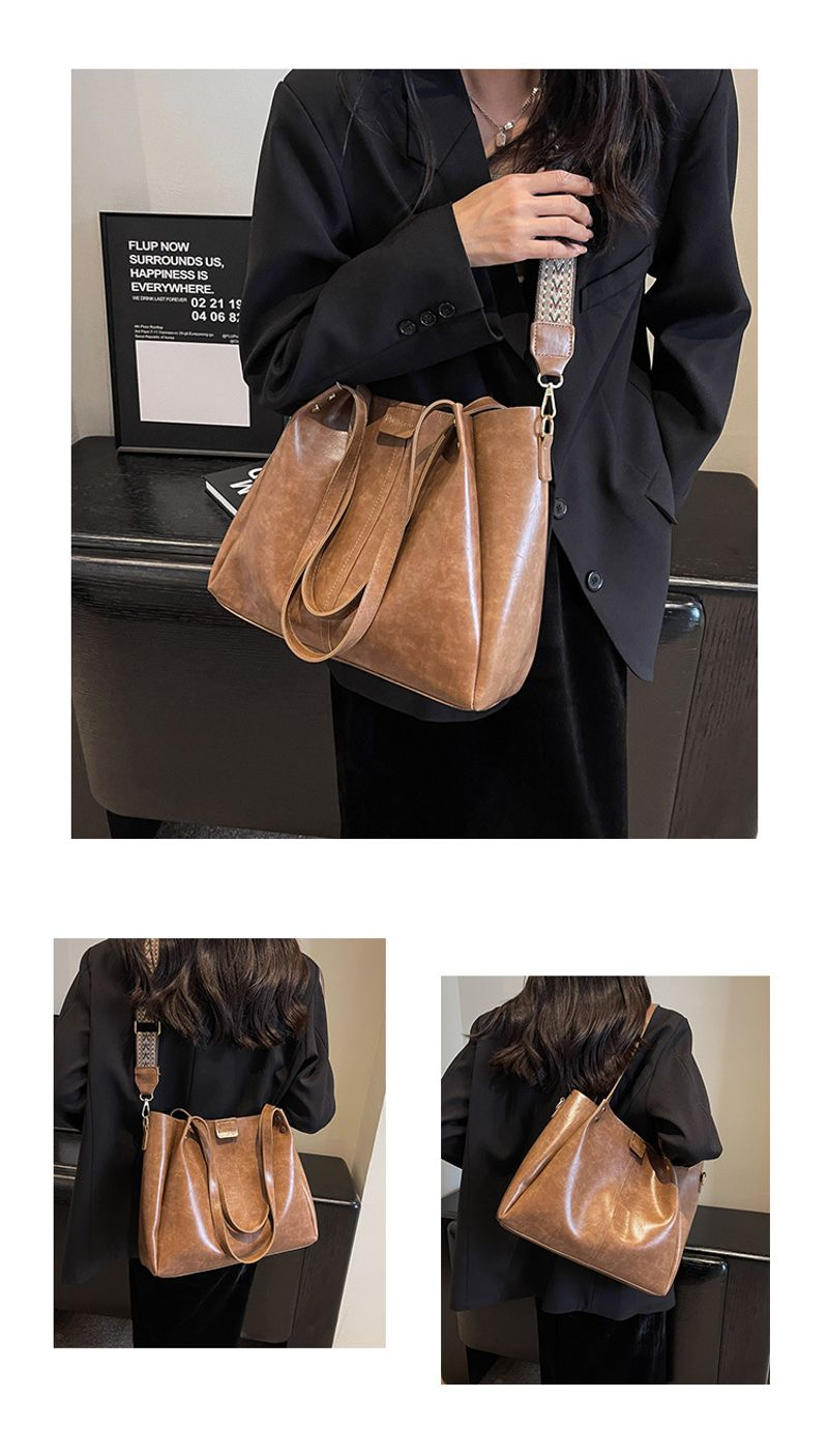 Tote per pendolari retrò di grande capacità in Europa e negli Stati Uniti 2023 nuova tracolla a tracolla con tracolla larga con texture a mano_voghion.com