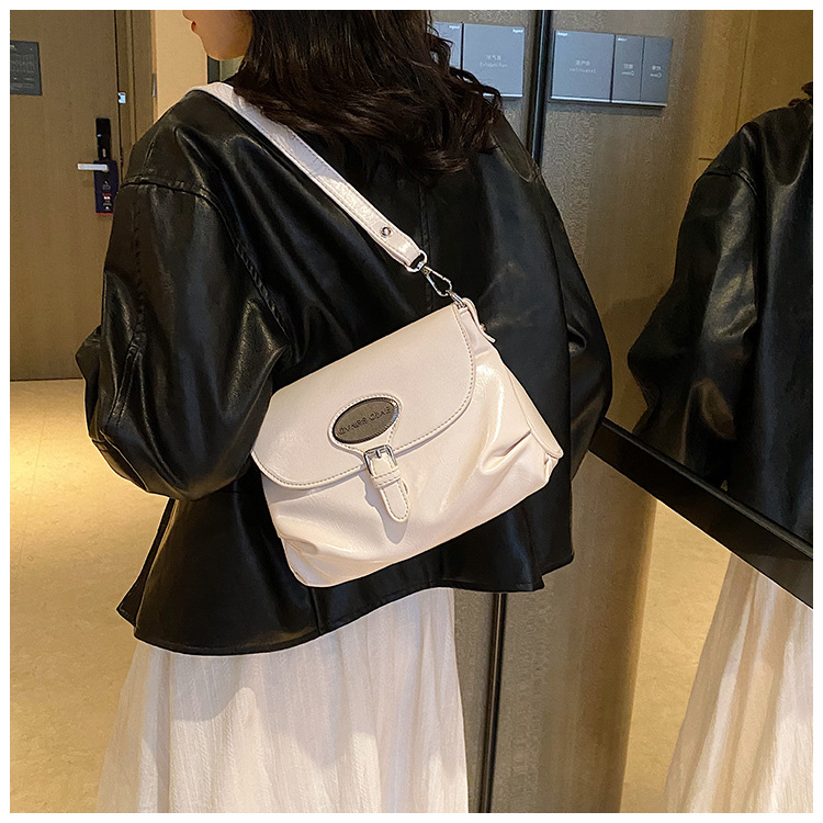 New Style Bag High-end Sense Bag Female Minority Design One-shoulder Messenger bag net red hot style all-match portable small square bag_voghion.com