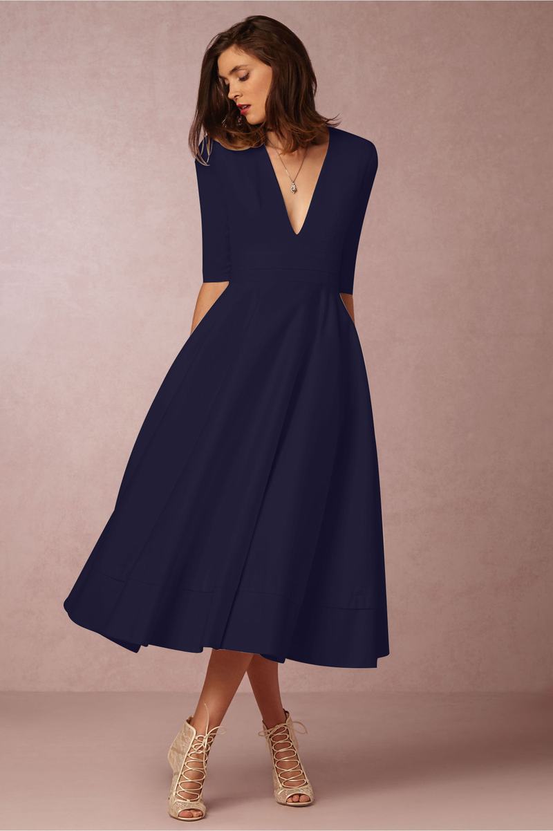 Abito da donna sexy a mezza manica con scollo a V profondo. Abito di media lunghezza_voghion.com