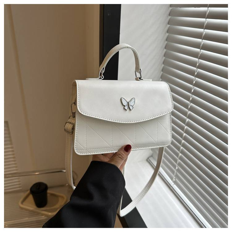 Fransk lyxig handväska i mild stil Butterfly Dekorativ liten väska Dam 2024 Sommar Ny västerländsk stil Crossbody-väska med en axel_voghion.com