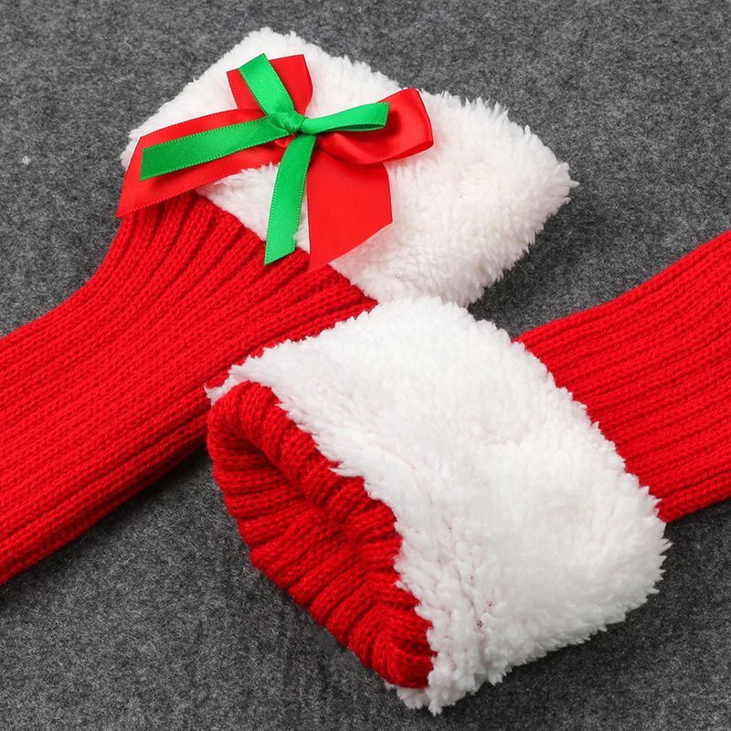 avec des chaussettes de Noël en velours pour femmes, des protections chaudes en tricot pour les jambes et les pieds, des chaussettes poilues à nœud papillon_voghion.com