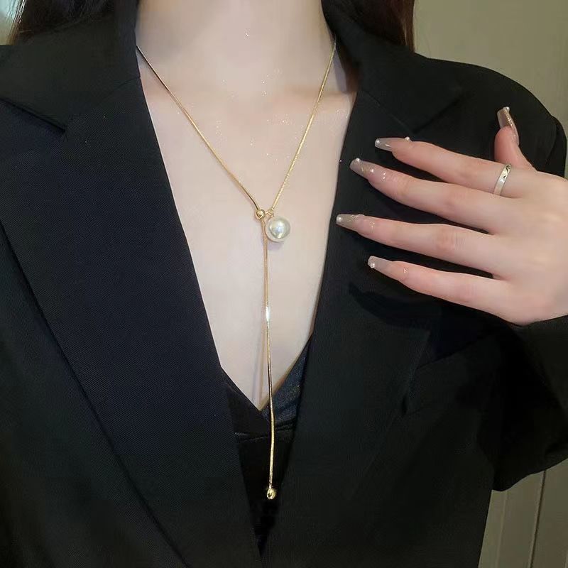 Adjustable pearl pendant titanium steel necklace sweater chain length_voghion.com