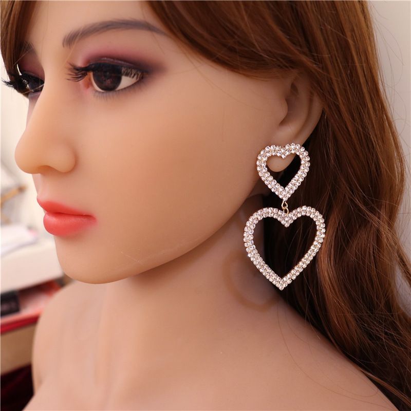 Orecchini femminili romantici dolci a forma di cuore di pesca vuoto di celebrità di Internet di moda coreana squisita_voghion.com