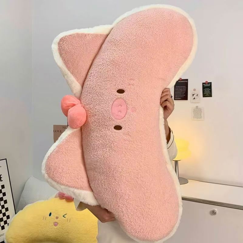 Süßes rosa Schweinchen mit Nackenrolle für Mädchen, um ihre Beine am Bett zu befestigen und so die Lendenwirbelsäule beim Schlafen zu stützen._voghion.com